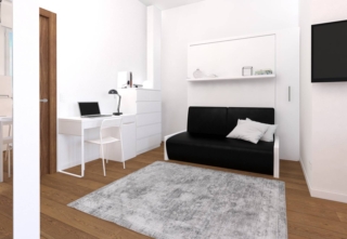 zona notte con letto a scomparsa e studio nel monolocale zona notte con letto a scomparsa e studio nel monolocale