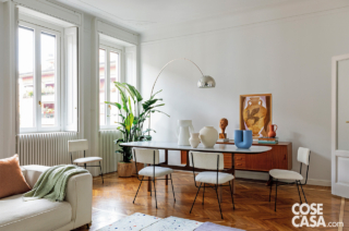 Zona pranzo con arredi vintage e di design