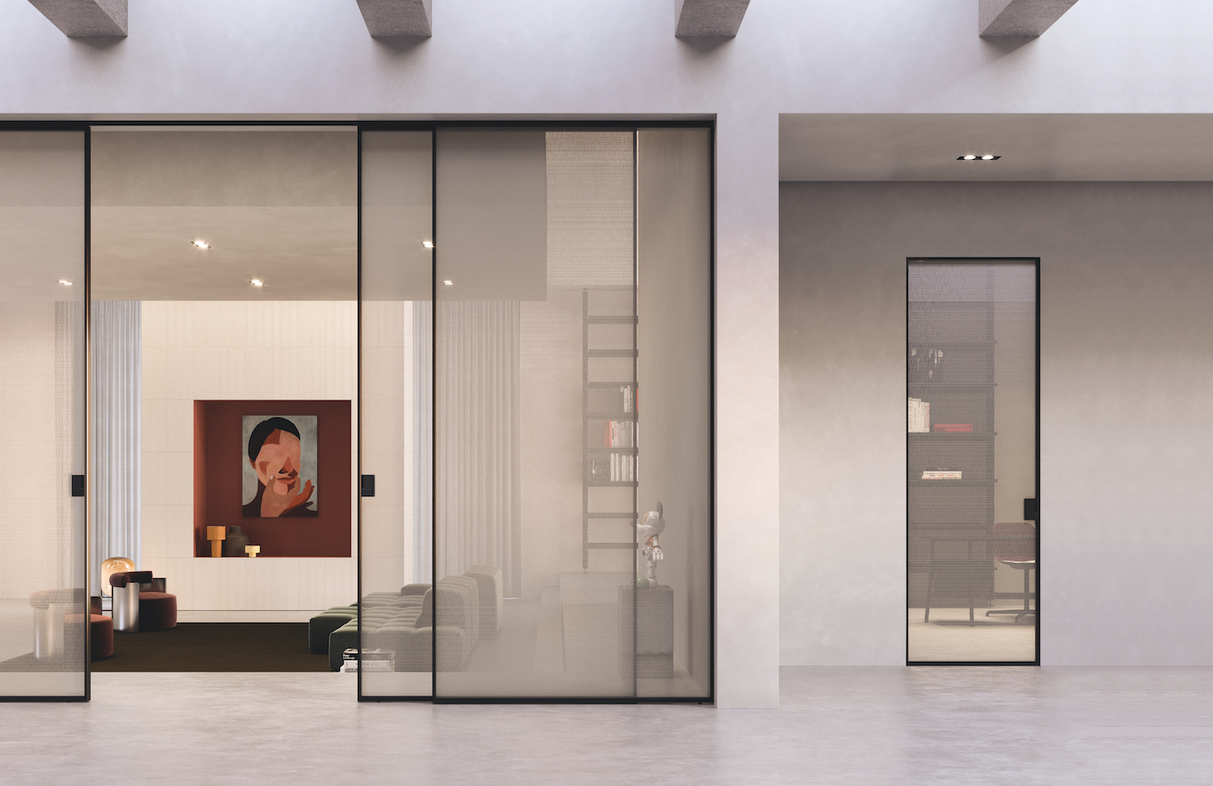 Sulla sinistra, nel modello Scenario Delineo, le 4 ante con profilo laccato nero hanno cristallo Textil Trasparente Extrachiaro Bianco e maniglia Wave nera. A destra il nuovo modello Frame Zero è proposto con cristallo Textil Trasparente Extrachiaro Bianco, profilo in alluminio nero e maniglia Wave per una coordinabilità stilistica tra modelli. Sulla sinistra, nel modello Scenario Delineo, le 4 ante con profilo laccato nero hanno cristallo Textil Trasparente Extrachiaro Bianco e maniglia Wave nera. A destra il nuovo modello Frame Zero è proposto con cristallo Textil Trasparente Extrachiaro Bianco, profilo in alluminio nero e maniglia Wave per una coordinabilità stilistica tra modelli.