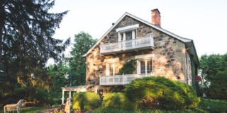 Early morning sunlight on a pretty cottage bed and breakfast in the country Early morning sunlight on a pretty cottage bed and breakfast in the country