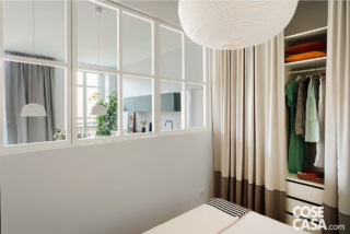 camera da letto con parete vetrata