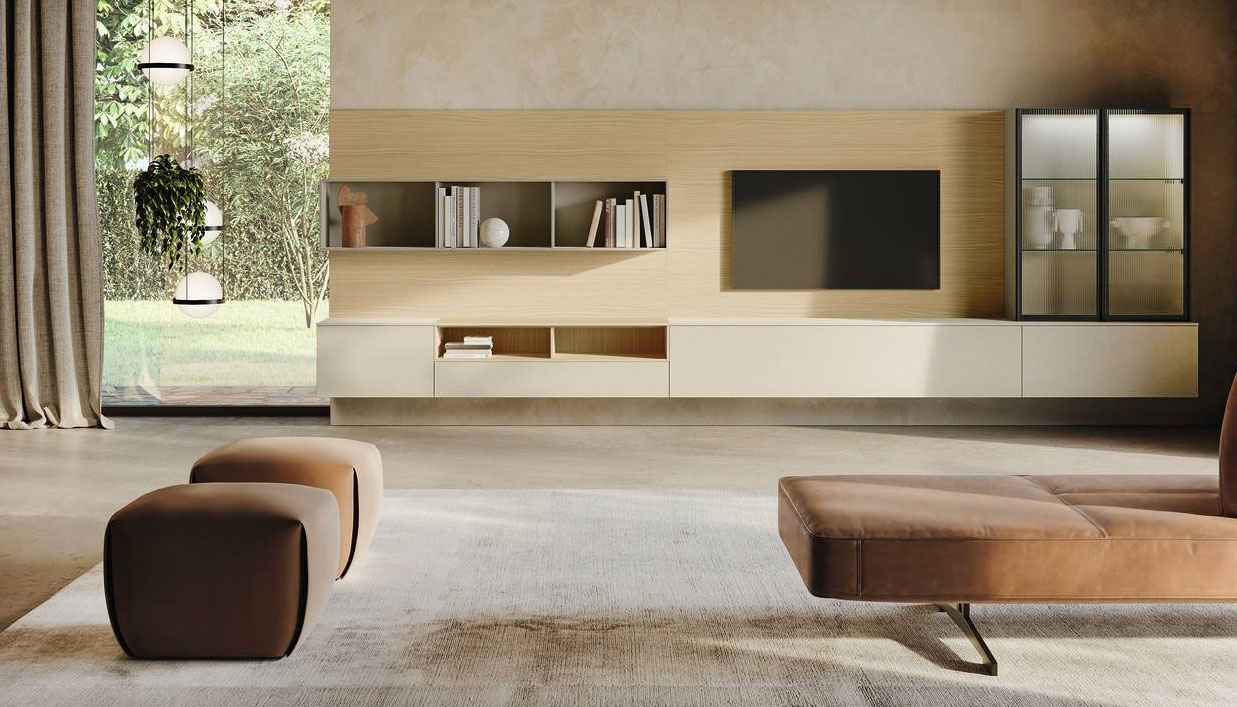 La grande composizione sospesa SM2521 di Zalf “veste” completamente la parete e permette di sistemare il maxi schermo Tv sulla base a giorno in appoggio nella finitura rovere. Il lungo pensile a sviluppo orizzontale è composto da basi sospese opus calce; quello verticale è chiuso da ante in vetro trasparente cannettato con telaio in metallo brunito. Prezzo 3.567 euro + IVA (per la composizione). https://www.zalf.com/it La grande composizione sospesa SM2521 di Zalf “veste” completamente la parete e permette di sistemare il maxi schermo Tv sulla base a giorno in appoggio nella finitura rovere. Il lungo pensile a sviluppo orizzontale è composto da basi sospese opus calce; quello verticale è chiuso da ante in vetro trasparente cannettato con telaio in metallo brunito. Prezzo 3.567 euro + IVA (per la composizione). https://www.zalf.com/it