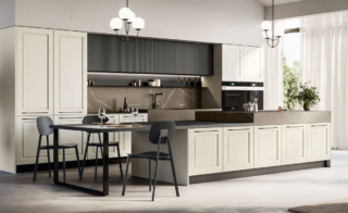 Stile classico per la cucina Asolo di Arredo3 che si sviluppa intorno all'isola centrale e può essere realizzata su misura e personalizzata in base alle esigenze. Ha le ante modanate realizzate in legno massello di frassino laccato poro aperto in una luminosa sfumatura di bianco. Lo schienale in effetto marmo è attrezzato con mensole Air in metallo e illuminato. Prezzo su richiesta. https://www.arredo3.it