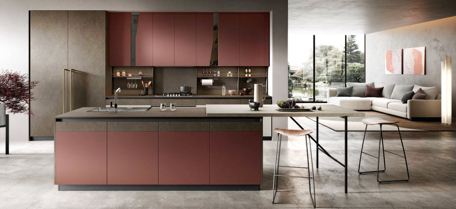 Colori caldi per la composizione Natural 5 di Moretti Compact Cucine che si sviluppa intorno all'isola con le basi in laccato Porpora Opaco, come i pensili. Lo schienale in melaminico Stone Brown è attrezzato con mensole e ganci in metallo nero opaco. Il piano snack in laminato HPL Stone Bianco è appoggiato direttamente sul top. Un modulo base da 60 cm, prezzo 259 euro (esclusi top, gola/maniglia e zoccolo). https://cucine.moretticompact.it