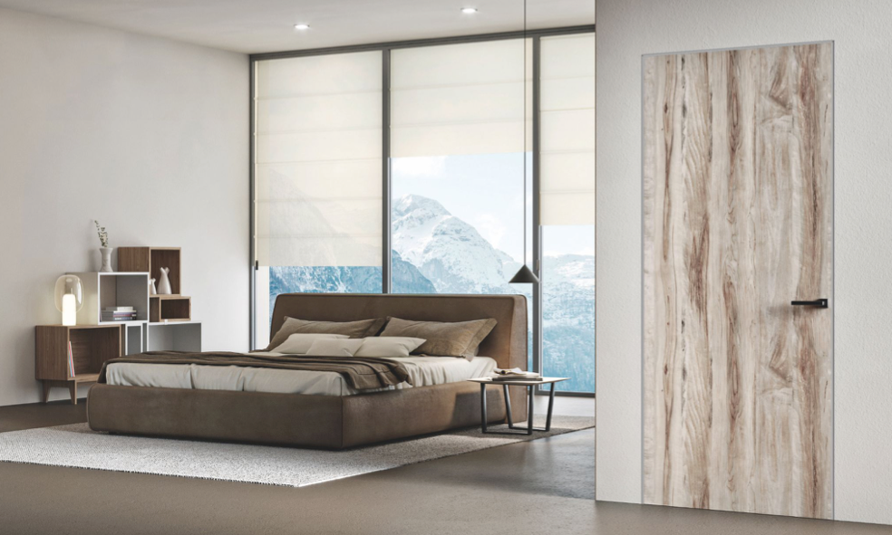 Silence nasconde un efficace meccanismo di sicurezza dietro l’apparenza di una normale porta per interni Silence nasconde un efficace meccanismo di sicurezza dietro l’apparenza di una normale porta per interni