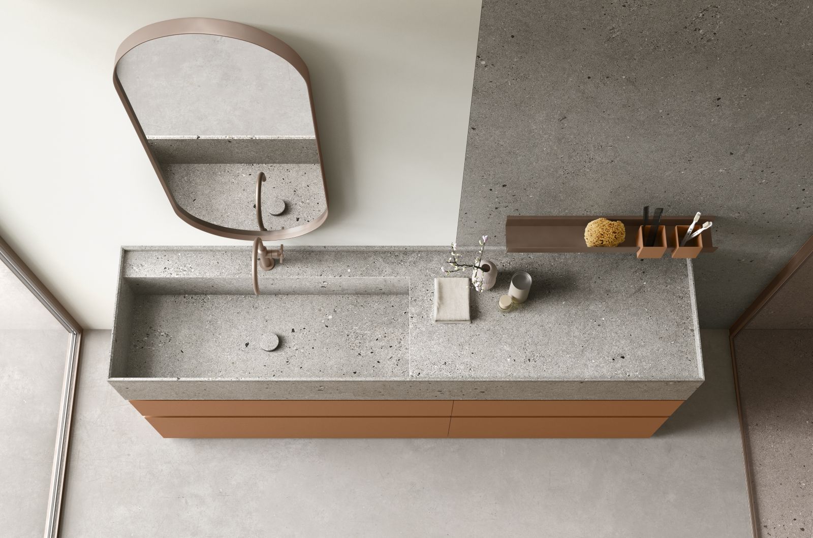 Il piano/top per lavabo Pool va a completare la collezione di arredobagno Soul di Arcom. È realizzato in Inalco Totem Gris Abujardado. Misura nel modello in foto L 205 x H 25 cm. Prezzo su richiesta. www.arcombagno.com