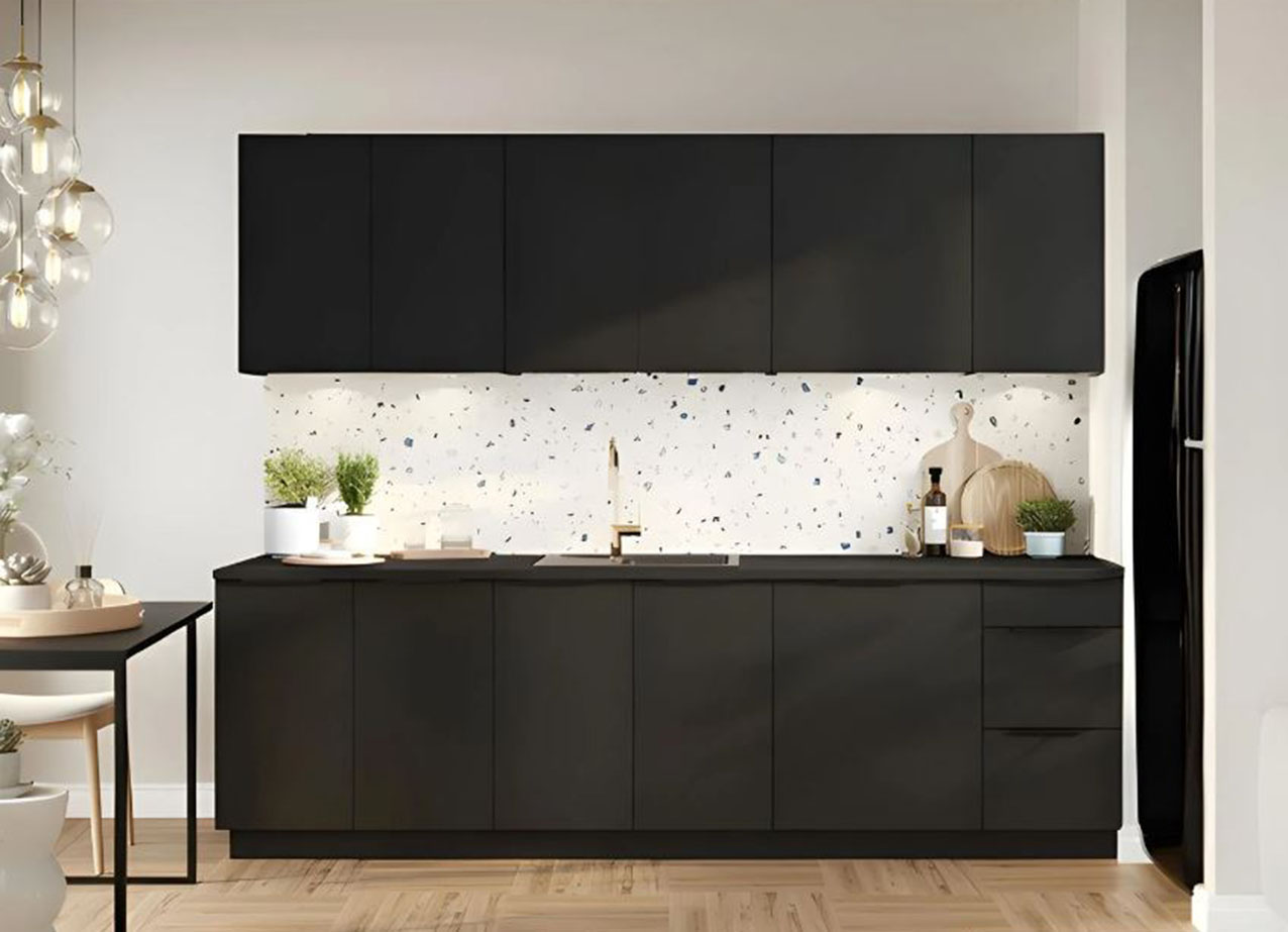 “Veste” la parete la cucina Stilo di Garnero Arredamenti che è composta da basi e pensili con i frontali delle ante in laminato Nero opaco. La colorazione scura ne sottolinea lo stile moderno ed essenziale. Misura L 260 x P 60 x H 210 cm. Prezzo 1.040 euro (esclusi cappa, lavello e elettrodomestici). https://www.garneroarredamenti.com