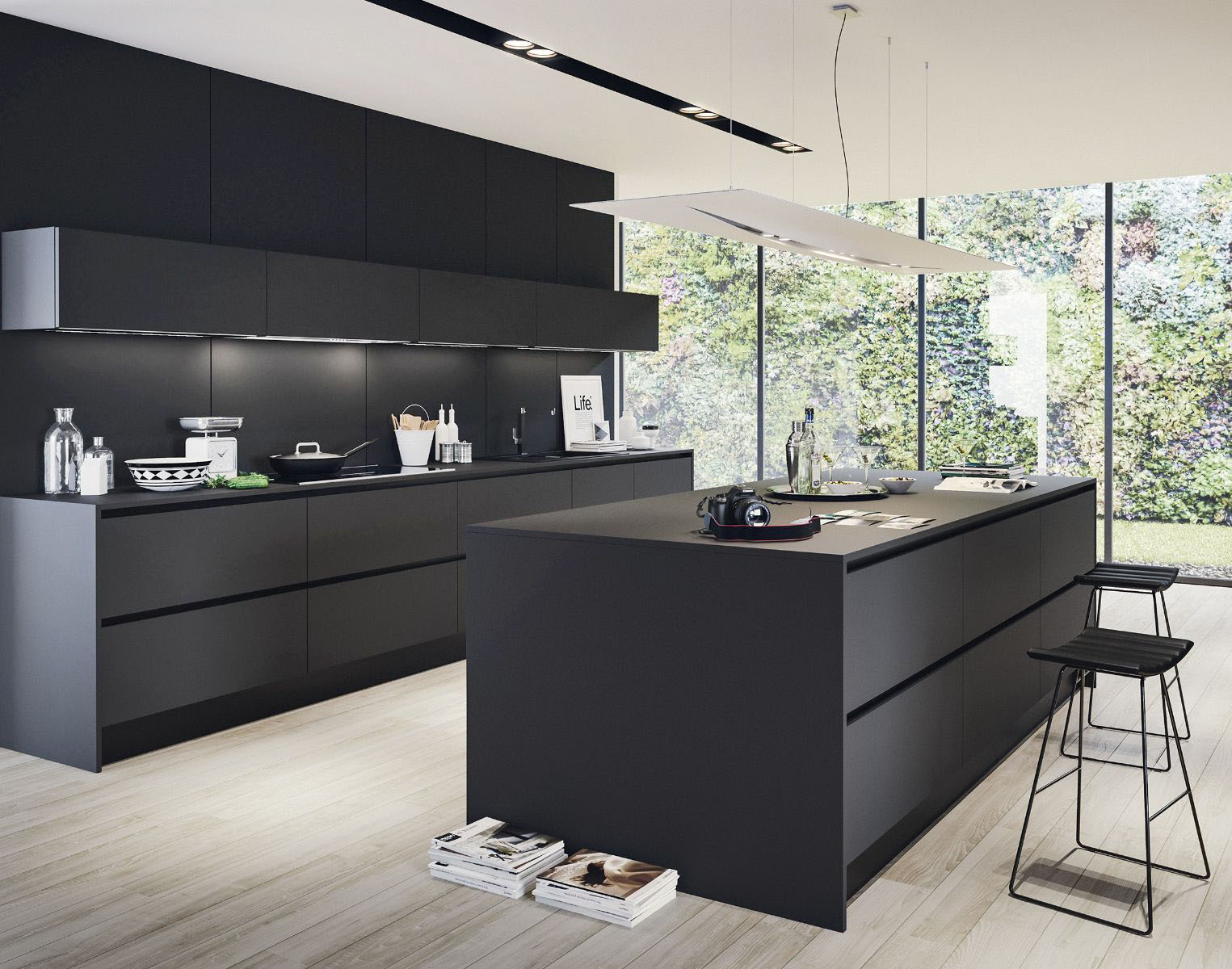 La cucina componibile Line di Conforama è composta da una grande isola che funge da bancone snack e da superficie multifunzionale e da una composizione lineare a parete attrezzata con la zona lavaggio e i fuochi. Le ante lisce nere, con apertura a gola, danno vita ad una superficie uniforme ed elegante. La composizione base misura L 300 x P 60 x H 216/240 cm, prezzo 2.429 euro (elettrodomestici, rubinetteria e accessori di allestimento esclusi). https://www.conforama.it