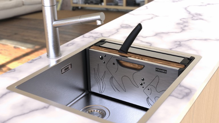 Per una cucina super organizzata, il kit Andy Chef di Franke include una vaschetta forata in acciaio inox, un coltello da chef in acciaio e un tagliere in legno di noce: tre elementi essenziali che creano una postazione operativa elegante, funzionale e sempre in ordine. Quando non utilizzati, tutti gli accessori possono essere riposti nella custodia per asciugarsi grazie al fondo forato. Misura 41x14 cm. Prezzo 411 euro. www.franke.com