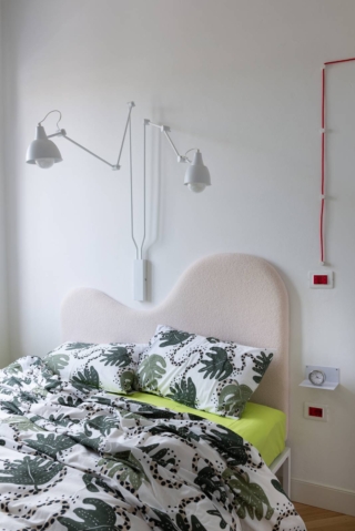 camera con testiera ondulata camera con testiera ondulata