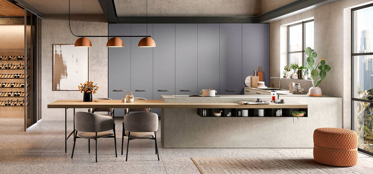 Una grande penisola attrezzata con il piano a induzione, con cappa integrata, e dotata di un tavolo laterale a sbalzo domina la cucina College di Moretti Compact Cucine. Le colonne che compongono l'armadiatura a parete hanno le ante in melaminico Grigio Orione, mentre quelle delle basi sono nella finitura Stone bianco. Il piano di lavoro è in laminato HPL Stone Bianco, il tavolo e il piano snack sono in laminato HPL Olmo Mercurio. Un modulo base da 60 cm, prezzo 204 euro (esclusi top e zoccolo). https://cucine.moretticompact.it