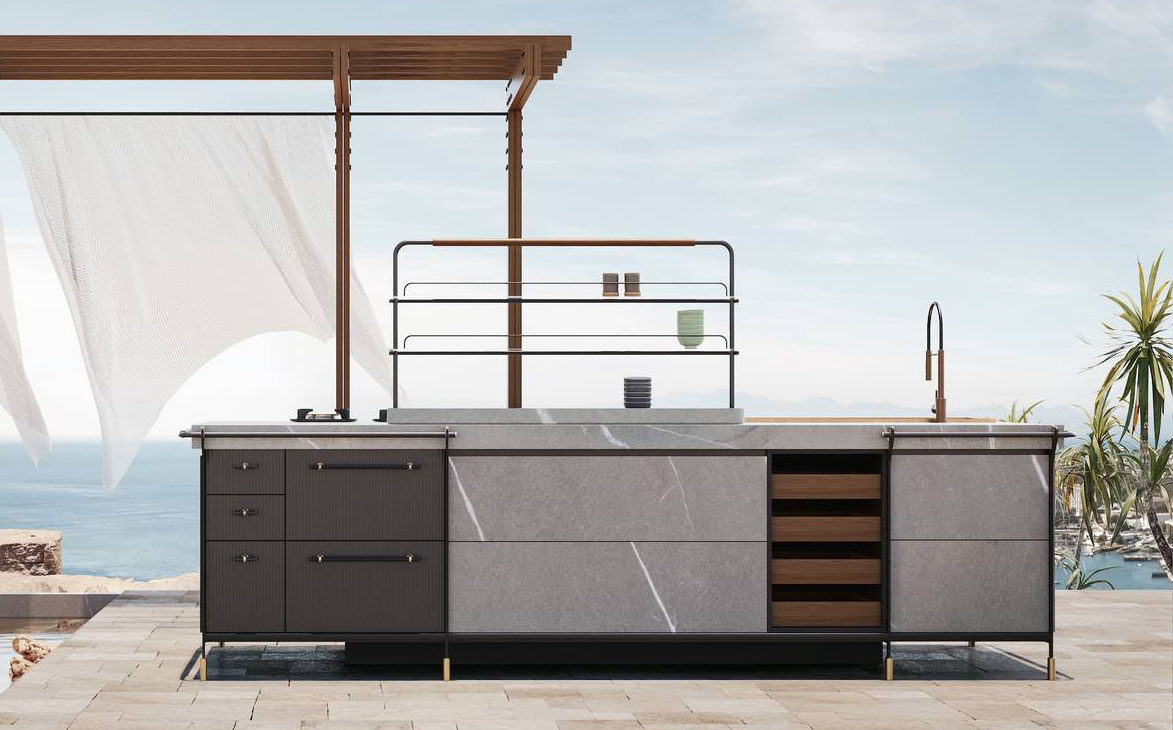 La cucina outdoor Canossa di SCIC Italia è modulare e multifunzionale: è composta da pezzi in fusione con finitura ottone e da elementi in metallo pieno e viene poi completata con moduli in legno per garantirne la solidità e la personalizzazione. Prezzo su richiesta. https://www.scic.it