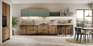 La cucina Moda di Scavolini si sviluppa linearmente a parete con le basi, i cassetti e le colonne caratterizzati da ante con telaio in Decorativo Rovere Land e maniglie ad incasso in metallo nella finitura Antracite. I pensili con ante piane in decorativo Selva “illuminano” la composizione. Il piano di lavoro, realizzato in Quarz Cloudy Beige, dà vita a un bancone snack laterale. Prezzo su richiesta. https://www.scavolini.com/it La cucina Moda di Scavolini si sviluppa linearmente a parete con le basi, i cassetti e le colonne caratterizzati da ante con telaio in Decorativo Rovere Land e maniglie ad incasso in metallo nella finitura Antracite. I pensili con ante piane in decorativo Selva “illuminano” la composizione. Il piano di lavoro, realizzato in Quarz Cloudy Beige, dà vita a un bancone snack laterale. Prezzo su richiesta. https://www.scavolini.com/it
