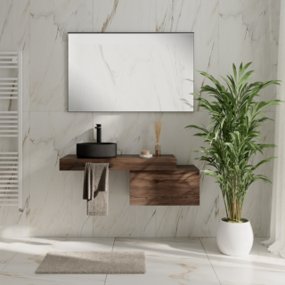 Il top autoportante per lavabo STEP/STAR di Leroy Merlin è in MDF rivestito PVC finitura noce. È pensato per lavabo d'appoggio non forato. Misura L 100,3 x P 46,5 x H 10 cm Prezzo 169,90 euro. www.leroymerlin.it