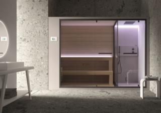 La sauna con hammam ETHOS C Sauna Vita® di Gruppo Geromin è molto compatta nelle dimensioni ed è realizzata in materiali pregiati e innovativi: la sauna finlandese è in Abachi, un legno idrorepellente, resistente alle alte temperature dal profumo avvolgente e rilassante, a zero trasmissibilità termica. L’intera struttura e l’interno dell’ambiente hammam sono dotati di rivestimento in Fenix. Grazie alla bassa riflessione della luce, questo materiale garantisce superfici opache, anti-impronta e soft touch. La sauna con doccia e bagno turco è dotata di pannello di controllo touch in vetro bianco e di sistema audio con Bluetooth. Grazie alle dimensioni molto compatte è indicata per piccoli ambienti e nelle ristrutturazioni per sostituire una precedente vasca o un box doccia. La soluzione in nicchia in foto misura L 252 x P 120 x H 215 cm. Prezzo su richiesta. https://gruppogeromin.com/