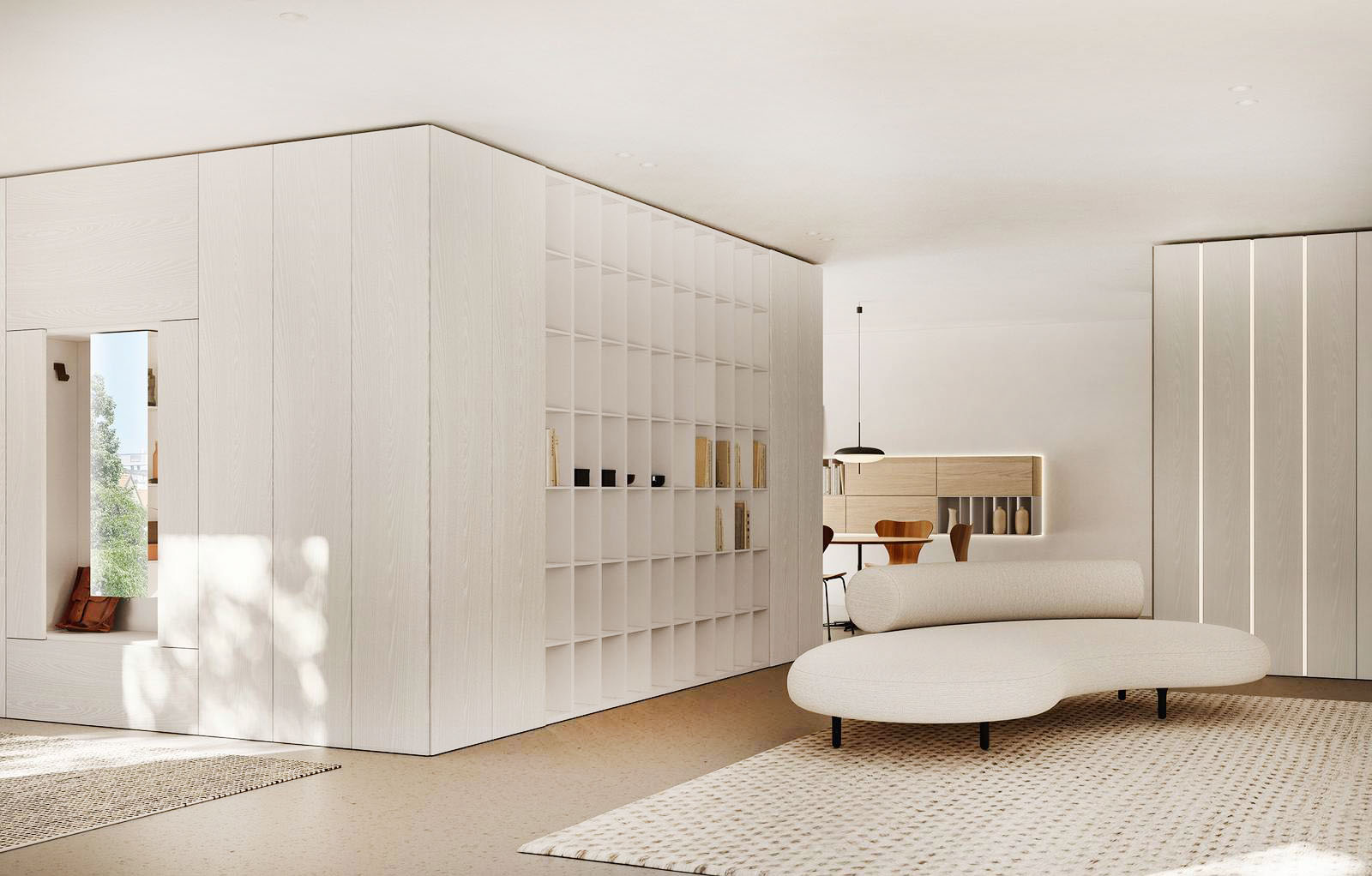 La composizione ad angolo, nata dall’integrazione tra sistemi, accompagna lo sguardo verso le due diverse aree del living.