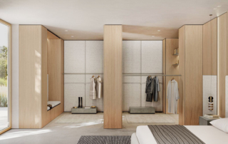 L’asta boutique si aggancia ai fianchi di Freedhome e definisce una cabina armadio a vista funzionale: uno spazio intimo che diventa il cuore della zona notte.