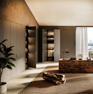 Skema Infinito con ante doppie a battente, finitura grezzo, per mimetizzarsi nello stesso colore della parete. Skema Infinito con ante doppie a battente, finitura grezzo, per mimetizzarsi nello stesso colore della parete.