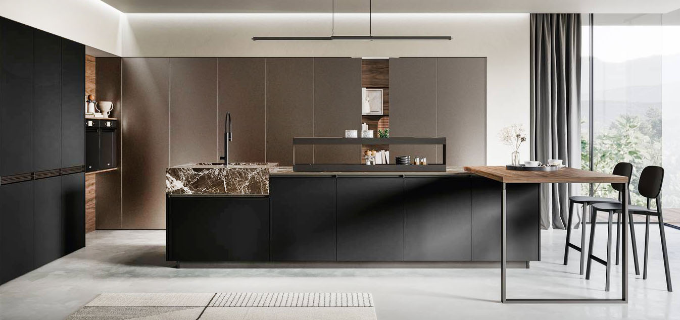 La cucina Kalì di Arredo3 si sviluppa ad angolo intorno alla grande isola attrezzata con la zona lavaggio e cottura che ha le basi con le ante in PET opaco riciclato Stromboli; sul piano in ceramica Iris dark Marquina poggia l'ampio piano snack in laminato noce imperial sostenuto da un supporto Star titanio. Le colonne hanno le ante effetto ferro ossidato, realizzate in laminato metal light.  Prezzo su richiesta. https://www.arredo3.com