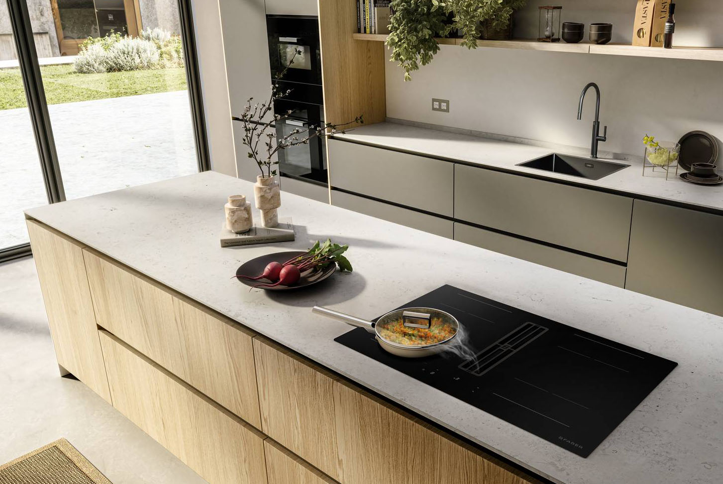 Largo 83 cm, Galileo Wide offre una nuova libertà d’uso, grazie alle zone di cottura più ampie e flessibili. Le due grandi Flexi Zones consentono di utilizzare pentole di ogni dimensione, il Frameless Design e la nuova superficie in vetro Ceran® nero opaco combinano invece eleganza e praticità: un materiale raffinato, resistente alle macchie e progettato per ridurre la visibilità di graffi e impronte, mantenendo nel tempo un’estetica impeccabile. Galileo Wide comprende anche un sistema aspirante con motore waterproof che raggiunge una portata d’aria fino a 720 m³/h in modalità boost. La configurazione interna è stata completamente riprogettata: la posizione centrale del motore e la riduzione dell’altezza complessiva permettono di recuperare spazio nel mobile sottostante. Galileo Wide è dotato di un sistema di controllo Touch con Ghost Single Slider, 9 livelli di potenza più funzione Boost su tutte e quattro le zone, e una potenza regolabile da 2,5 a 7,4 kW. www.faberspa.com
Fuorisalone 	Franke Flagship Store Via Pontaccio 18 Milano