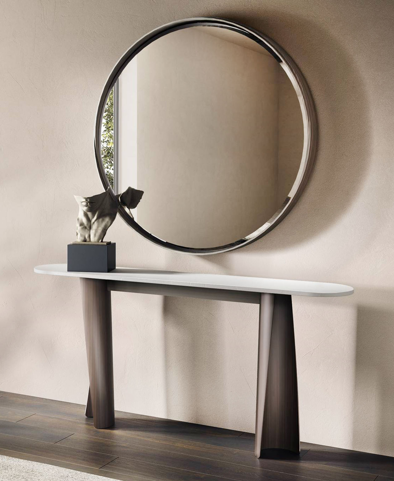 La consolle Ulisse di Cantori ha un top in marmo bianco sagomato che poggia su due sostegni in lamiera piena, curvata a spirale, che sottolineano la leggerezza della struttura.  https://www.cantori.it - Salone del mobile 2026, padiglione 15, Stand B05.