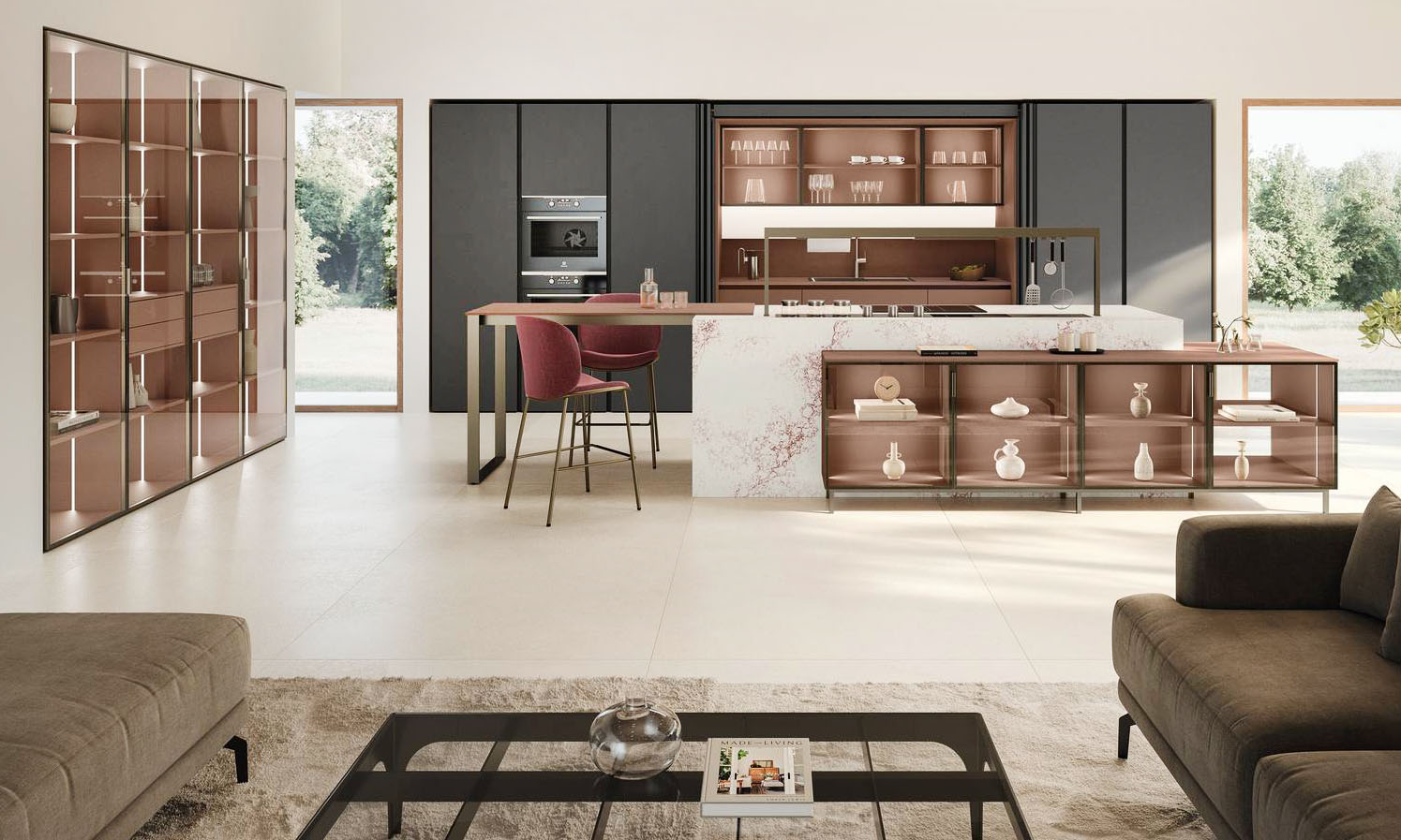 L'isola della composizione Lounge di Veneta Cucine trova posto al centro della zona giorno che è arredata con colonne a vetri e madie con gli schienali nelle nuance della cucina; inoltre, è rivestita in Caranto Quartz Corniola ed è dotata di un bancone in Caranto Ker Palette Rosso Boston. Le colonne in Laccato opaco Ardesia incorniciano le basi e i pensili Sunset in Laccato opaco Rosso Etrusco. Un modulo base da 60 cm, prezzo a partire da 379 euro. https://www.venetacucine.com