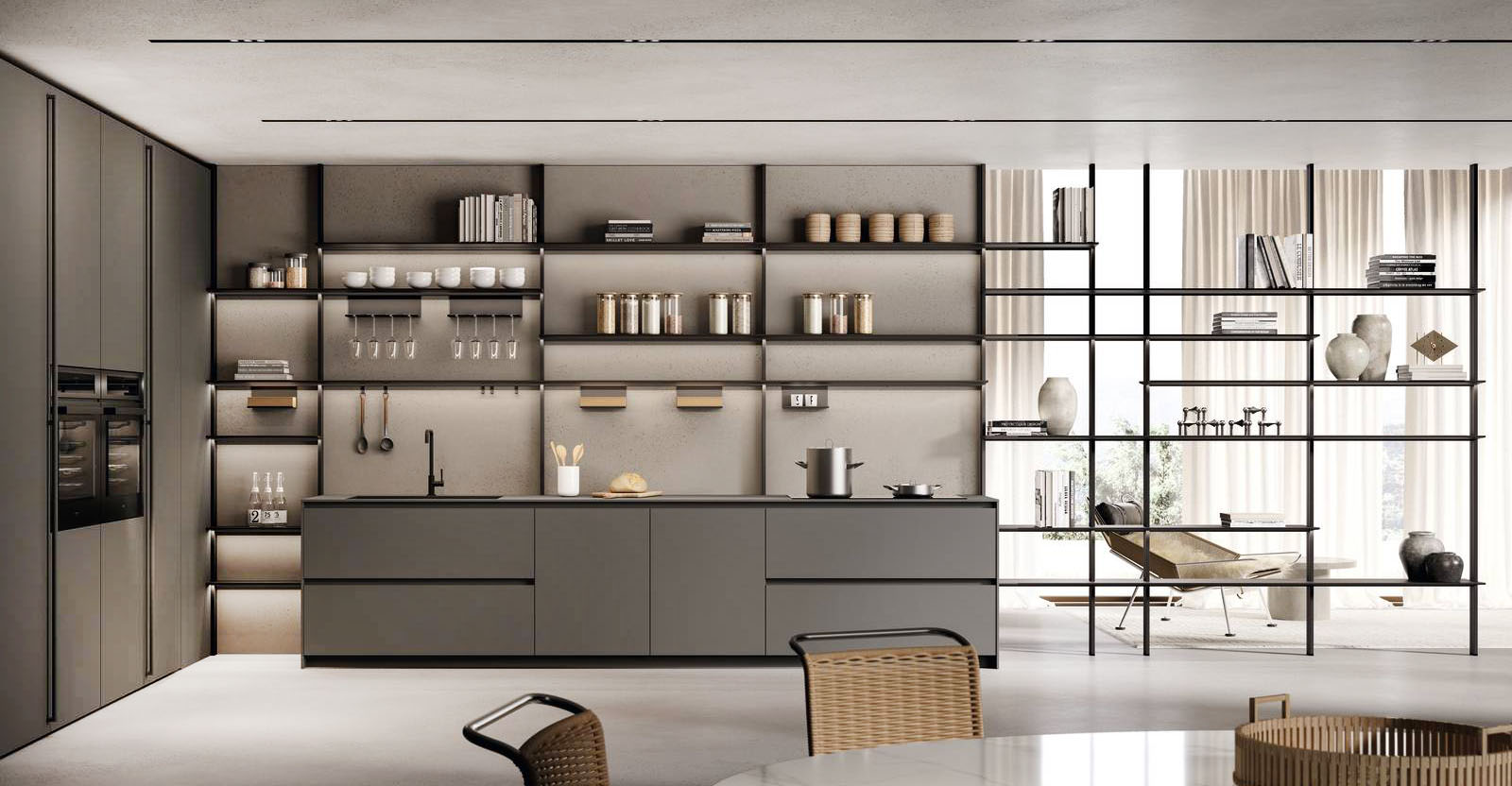 Si integra perfettamente nella zona giorno la cucina ONE di Ernestomeda con il suo design lineare e funzionale nello stesso tempo: gli elementi in alluminio Jetgrey del sistema Open System, nella tipologia in appoggio sul top e a libreria passante, arredano sia la zona operativa sia il living. Le colonne In Space in Hi-melamine Rovere Sami danno vita ad una capiente armadiatura a parete. Prezzo su richiesta. https://www.ernestomeda.com