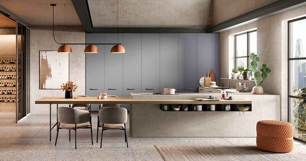 Il modello senza pensili College di Moretti Compact Cucine è caratterizzato dalla presenza di una lunga penisola, con il piano di lavoro in melamminico stone e il piano a induzione con cappa integrata, che ingloba un tavolo snack  a sbalzo in olmo mercurio con uno spessore importante. Sulla parete posteriore trovano posto le colonne attrezzate con le ante in melamminico grigio orione e sottili maniglie metalliche orizzontali.  Il design minimale e pulito rende lo spazio luminoso e accogliente. Un modulo base decorata con Rose da 60 cm, prezzo 178 euro (esclusi top, gola o maniglia, zoccolo). https://cucine.moretticompact.it