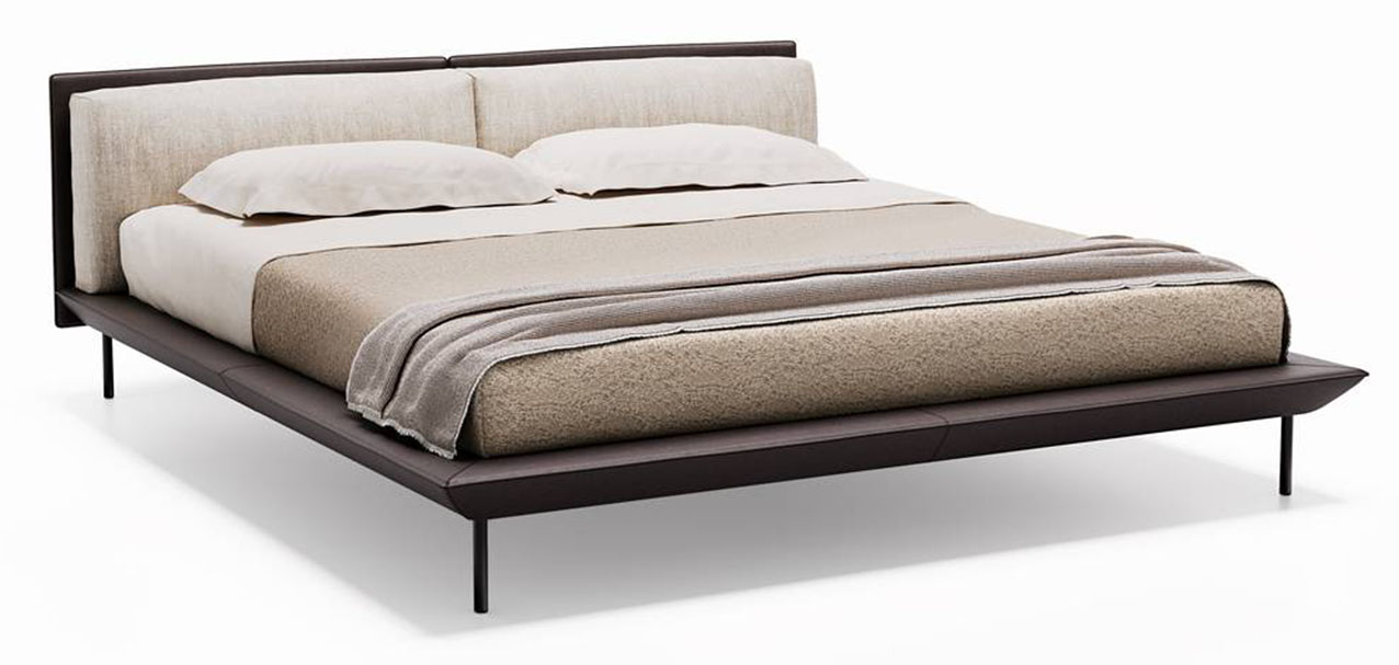 Il letto Greene Bed di Living Divani ha una linea delicata e avvolgente sottolineata dallo schienale curvo e da una base leggera e slanciata. https://www.livingdivani.it - Salone del mobile 2026, padiglione 11, Stand C15, D16.