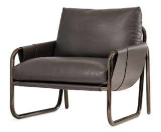 La poltrona Graffetta di Lema ha una struttura in tubolare di acciaio sagomato che accoglie i morbidi e voluminosi cuscini che assicurano un perfetto sostegno, senza interrompere la pulizia formale. https://www.lemamobili.com - Salone del mobile 2026, padiglione 11, Stand B11, C20.