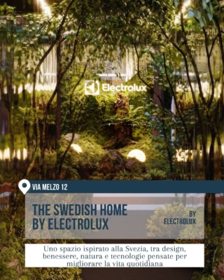 Ambiente verde e suggestivo in via Melzo 12 con alberi, muschio, luci soffuse e superfici riflettenti. The Swedish Home by Electrolux interpreta la casa come spazio di benessere, natura e tecnologia durante la Milano Design Week 2026.