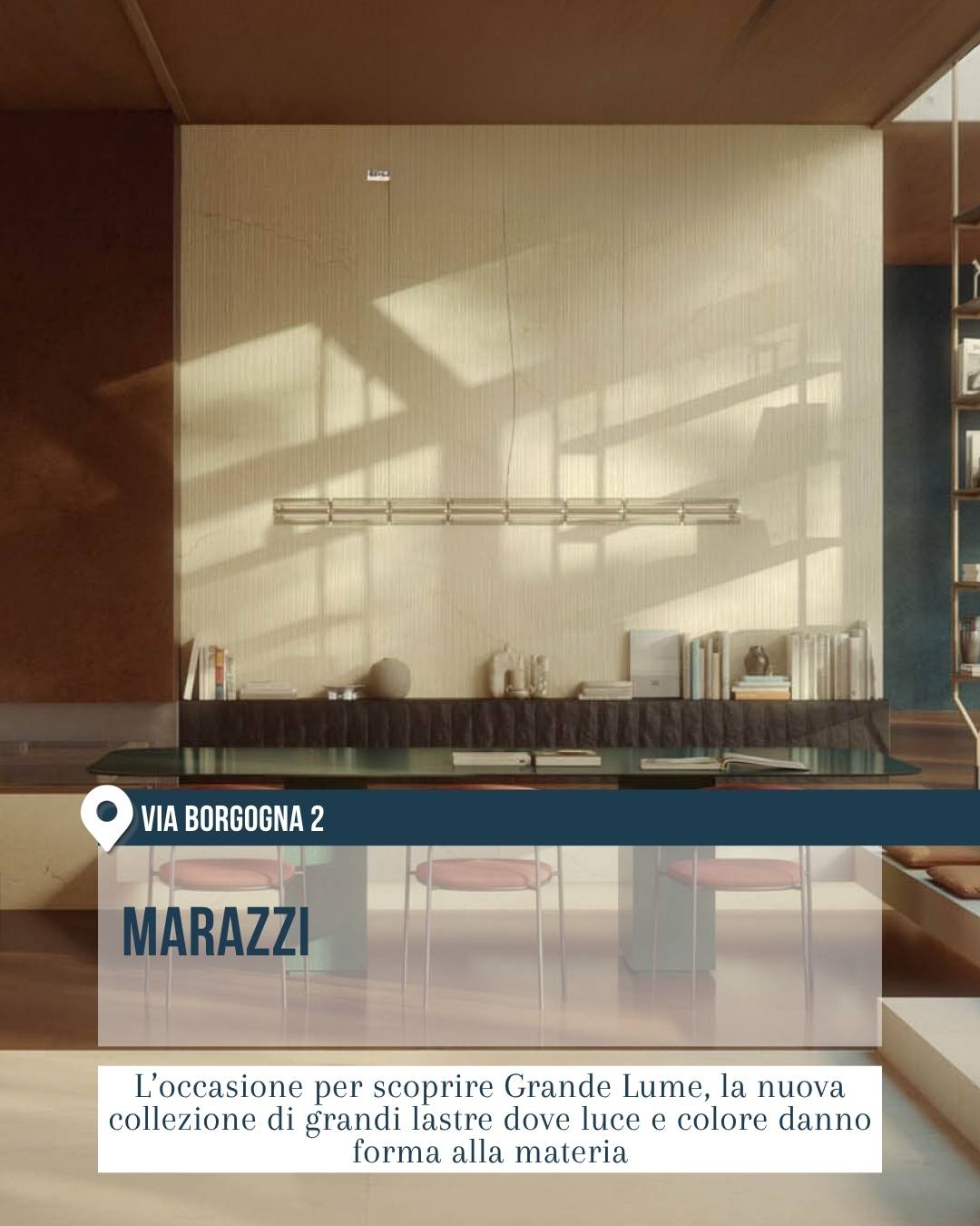Marazzi in via Borgogna 2 a Milano, tra gli showroom del Fuorisalone 2026. L’immagine mostra un ambiente elegante e luminoso con grande tavolo, sedute leggere, superfici materiche e luce naturale, dedicato alla collezione Grande Lume di grandi lastre.