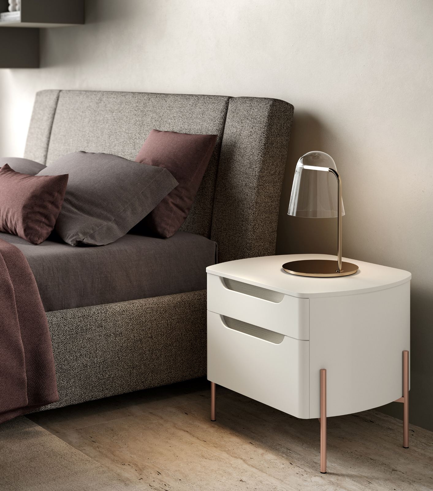 Un equilibrio tra leggerezza visiva e carattere progettuale definisce il comodino Ambra del gruppo notte Moretti Compact Giorno Notte. Le forme arrotondate dei fianchi offrono un segno morbido e continuo, che rompe la rigidità del volume tradizionale. Appoggiato su sottili piedini metallici, il complemento acquista slancio e leggerezza, mentre l’apertura dei cassetti, ricavata da un’impugnatura sagomata, diventa un dettaglio funzionale e di design. Disponibile nelle finiture laccato Bianco Opaco, Nichel Metallizzato; dettagli in alluminio Golden Rose. Misure L 54,5 × P 45,9 × H 47,3 cm. Prezzo 890 euro Iva inclusa. www. giornonotte.moretticompact.it Un equilibrio tra leggerezza visiva e carattere progettuale definisce il comodino Ambra del gruppo notte Moretti Compact Giorno Notte. Le forme arrotondate dei fianchi offrono un segno morbido e continuo, che rompe la rigidità del volume tradizionale. Appoggiato su sottili piedini metallici, il complemento acquista slancio e leggerezza, mentre l’apertura dei cassetti, ricavata da un’impugnatura sagomata, diventa un dettaglio funzionale e di design. Disponibile nelle finiture laccato Bianco Opaco, Nichel Metallizzato; dettagli in alluminio Golden Rose. Misure L 54,5 × P 45,9 × H 47,3 cm. Prezzo 890 euro Iva inclusa. www. giornonotte.moretticompact.it