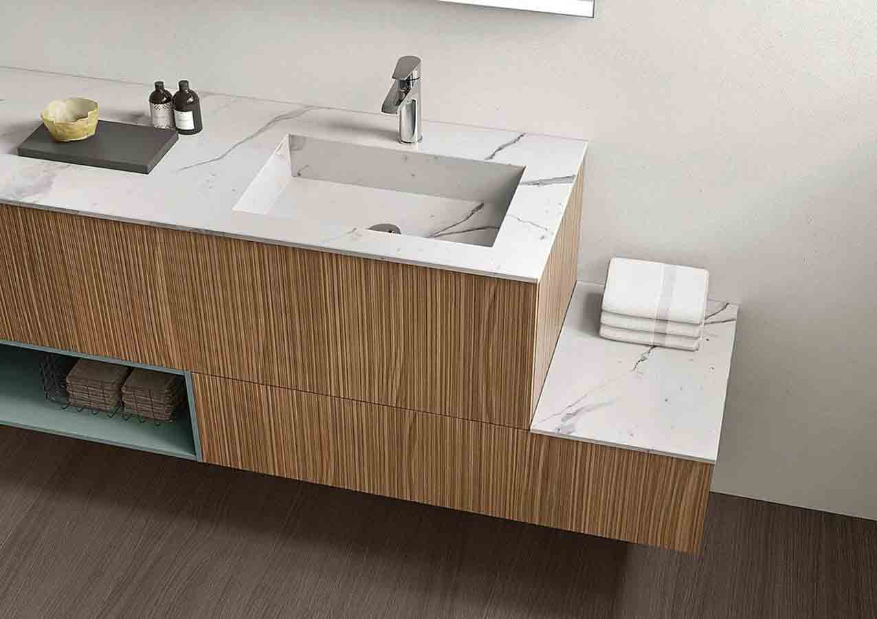 Il modello della collezione Elite di Gruppo Geromin è realizzato in gres Bianco Statuario come il top, ha base in Noce Millerighe e modulo a giorno in Laccato Salvia Opaco. Misura L 50 x P 30 cm, prezzo su richiesta. www.gruppogeromin.com Il modello della collezione Elite di Gruppo Geromin è realizzato in gres Bianco Statuario come il top, ha base in Noce Millerighe e modulo a giorno in Laccato Salvia Opaco. Misura L 50 x P 30 cm, prezzo su richiesta. www.gruppogeromin.com