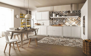 Sfrutta a pieno le pareti la cucina angolare M04 di Scandola Mobili che è caratterizzata dagli arredi con frontali dogati nella finitura Bianco Gesso, con boiserie e cassetti Curry; la cappa sospesa e il top sono realizzati in Hanex. L'ampia composizione bianca unisce il rigore dello stile moderno e l’utilizzo di materiali della tradizione come il legno. Un modulo base da 60 cm con un'anta, prezzo 493 euro + IVA. https://scandolamobili.it