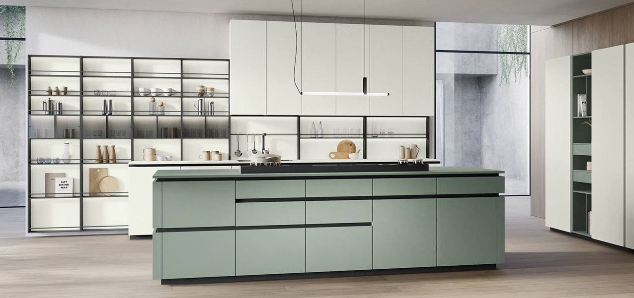 Nella cucina Shade Lab di Lube il colore si trasforma in un vero e proprio protagonista in grado di illuminare l'ambiente. Le ante sono disponibili in una grande varietà di finiture laccate nelle varianti lucide, opache, super opache o speciali. L'isola centrale è caratterizzata dalle ante in laccato Super opaco verde kitami e dal top in Laminato Fenix coordinato; le colonne a parete e i pensili a sviluppo verticale sono in Super opaco bianco. Prezzo su richiesta. https://www.cucinelube.it