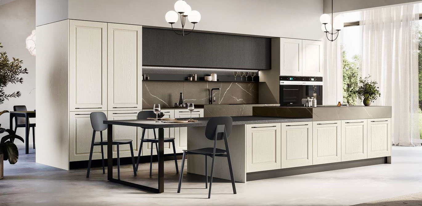 Un'ampia isola rettangolare per la cucina Asolo di Arredo3 che è attrezzata con la zona cottura e che è dotata di un tavolo da pranzo integrato lateralmente in impiallacciato coke su supporto Star in metallo nero che lo rende contemporaneo. Le ante a telaio in bianco decapè delle basi e delle colonne creano un raffinato contrasto con quelle effetto cannettato dei pensili a sviluppo orizzontale. Prezzo su richiesta. https://www.arredo3.com Un'ampia isola rettangolare per la cucina Asolo di Arredo3 che è attrezzata con la zona cottura e che è dotata di un tavolo da pranzo integrato lateralmente in impiallacciato coke su supporto Star in metallo nero che lo rende contemporaneo. Le ante a telaio in bianco decapè delle basi e delle colonne creano un raffinato contrasto con quelle effetto cannettato dei pensili a sviluppo orizzontale. Prezzo su richiesta. https://www.arredo3.com