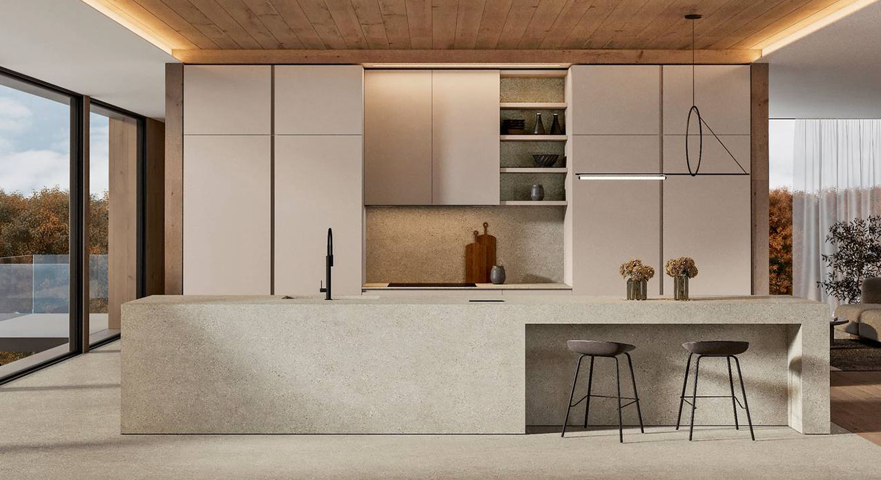 La cucina di Arrex con le ante Gea è disponibile in 5 finiture eco PET, 3 cementi PET 100% riciclabili e una inedita selezione di colori laccati raccolti in 4 mood: Aria, Acqua, Terra e Fuoco. La composizione a parete, che si contrappone all'ampia isola centrale con piano di lavoro in Gres Shilin e il lavello, è dotata di una nicchia con la zona cottura racchiusa tra le colonne nelle delicate sfumature beige. Prezzo su richiesta. https://www.arrex.it
