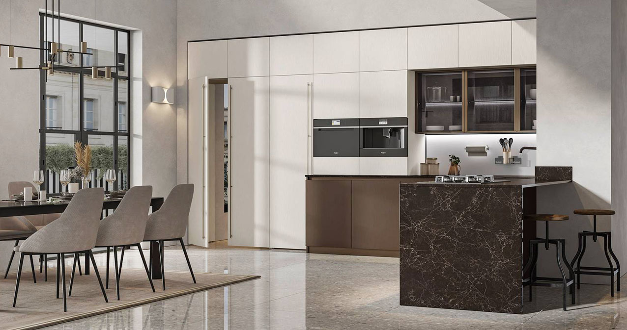 Il modello Loft 2.2 di Arrex si sviluppa ad angolo ed è dotato di una piccola penisola, nella finitura effetto marmo,  attrezzata con i fuochi e con un piano snack. Dietro le ante si apre il vano dispensa, organizzato su misura e attrezzato con accessori professionali e complementi personalizzati. Le basi hanno le ante lisce con apertura a gola in laccato Metal Bronzo che danno vita ad un raffinato contrasto con quelle delle colonne e dei pensili nella finitura Metal Ice. Le vetrine Officina con il telaio bronzo con maniglia integrata e lo schienale luminoso in vetro lucido Bianco completano la composizione. Prezzo su richiesta. https://www.arrex.it