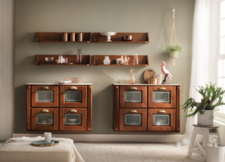 Ispirazione retrò per le madie sospese della collezione Madeleine di Scavolini: hanno la struttura realizzata in Noce Kyoto e le ante in Castagno con i vetri serigrafati. Il piano è realizzato in Laminato Tadao Beige. Misura L 105 x P 36,7 x H 77 cm. Prezzo su richiesta. https://www.scavolini.com