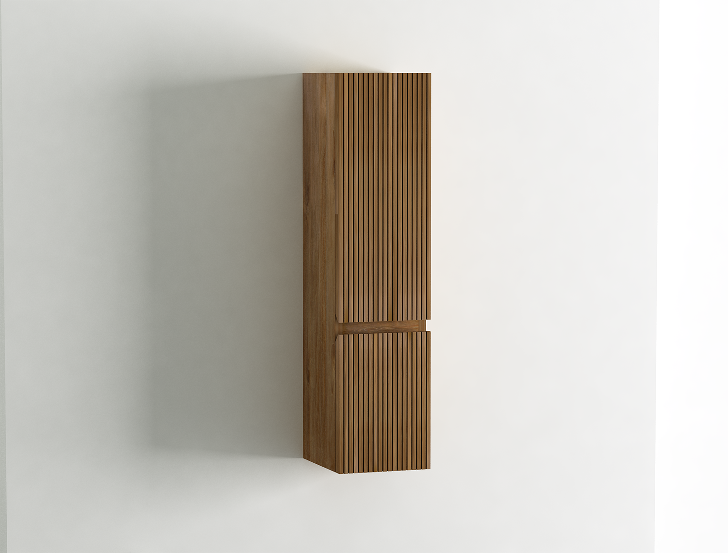 Ha due ante con apertura verso destra e con impugnatura a taglio 45° a chiusura rallentata il pensile bagno LOMBOK di Iperceramica. È realizzato in legno naturale massello di teak. Dal design minimal, ha lavorazione cannettata verticale, finitura Teak Naturale. All’interno dispone di 3 ripiani. Misura L 25 x P 25 x H 100 cm. Prezzo 549,99 euro. www.iperceramica.it