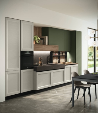 La composizione lineare Beverly di Stosa è caratterizzata dalla presenza di un volume centrale di profondità aumentata rispetto allo standard e del monoblocco, in HPL finitura Grafite brown, che ospita lavello e piano cottura. Le ante a telaio delle basi e delle colonne nella finitura frassino Grigio Polvere, con gola Nero spazzolato, sono abbinate a quelle lisce dei pensili e della colonna in Color Trend laccato opaco Edera. Il top è realizzato in laminato Noce Eucalipto. Prezzo su richiesta. https://www.stosacucine.com La composizione lineare Beverly di Stosa è caratterizzata dalla presenza di un volume centrale di profondità aumentata rispetto allo standard e del monoblocco, in HPL finitura Grafite brown, che ospita lavello e piano cottura. Le ante a telaio delle basi e delle colonne nella finitura frassino Grigio Polvere, con gola Nero spazzolato, sono abbinate a quelle lisce dei pensili e della colonna in Color Trend laccato opaco Edera. Il top è realizzato in laminato Noce Eucalipto. Prezzo su richiesta. https://www.stosacucine.com