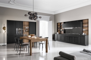 Frida di Arredo3 è la cucina che unisce lo stile contemporaneo ad un'impronta classica: le ante delle basi e delle colonne sono in laccato poro aperto nero, mentre il top con il lavello integrato è realizzato in Abitum Plutonio Black. Sulla boiserie in laminato noce America trova posto la struttura in alluminio anodizzato nero. https://www.arredo3.com Frida di Arredo3 è la cucina che unisce lo stile contemporaneo ad un'impronta classica: le ante delle basi e delle colonne sono in laccato poro aperto nero, mentre il top con il lavello integrato è realizzato in Abitum Plutonio Black. Sulla boiserie in laminato noce America trova posto la struttura in alluminio anodizzato nero. https://www.arredo3.com