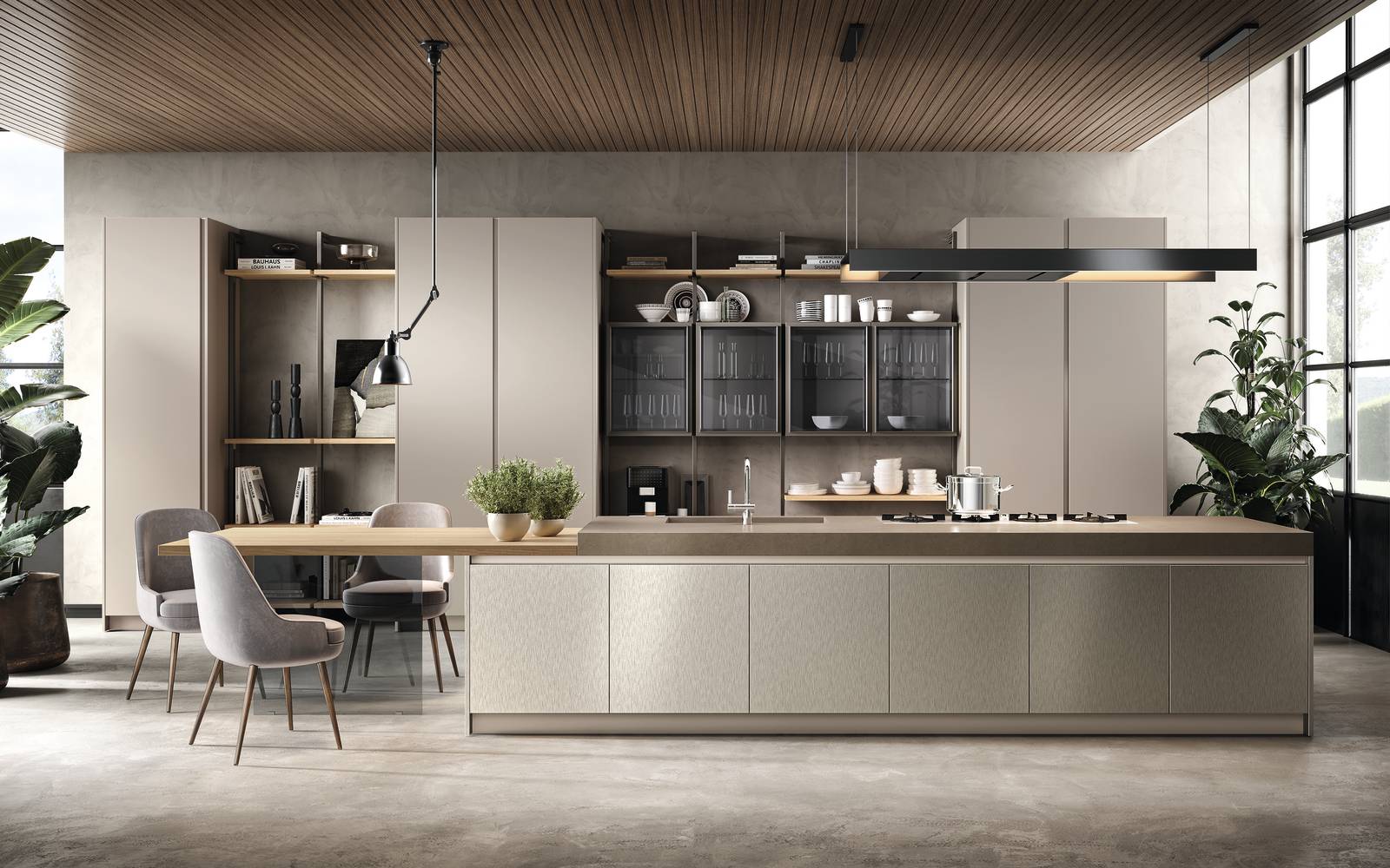 É dominata dalla presenza di un'ampia isola centrale, con piano di lavoro in Laminam Fokos Roccia dallo spessore maggiorato e lavello integrato abbinato alle ante delle basi in laccato metallizzato Nichel, la composizione Venere di Moretti Compact Cucine. Il tavolo a sbalzo ha il top in laminato HPL olmo mercurio e la gamba in vetro temprato finitura Fumé. La libreria Virgo trova posto tra le colonne con anta battente; i pensili con ante vetrina hanno telaio Kosmos metal gray e vetro fumè. Un pensile con anta telaio in alluminio e vetro Fumé, con presa maniglia integrata, prezzo a partire da 404 euro + Iva. https://www.moretticompact.it É dominata dalla presenza di un'ampia isola centrale, con piano di lavoro in Laminam Fokos Roccia dallo spessore maggiorato e lavello integrato abbinato alle ante delle basi in laccato metallizzato Nichel, la composizione Venere di Moretti Compact Cucine. Il tavolo a sbalzo ha il top in laminato HPL olmo mercurio e la gamba in vetro temprato finitura Fumé. La libreria Virgo trova posto tra le colonne con anta battente; i pensili con ante vetrina hanno telaio Kosmos metal gray e vetro fumè. Un pensile con anta telaio in alluminio e vetro Fumé, con presa maniglia integrata, prezzo a partire da 404 euro + Iva. https://www.moretticompact.it