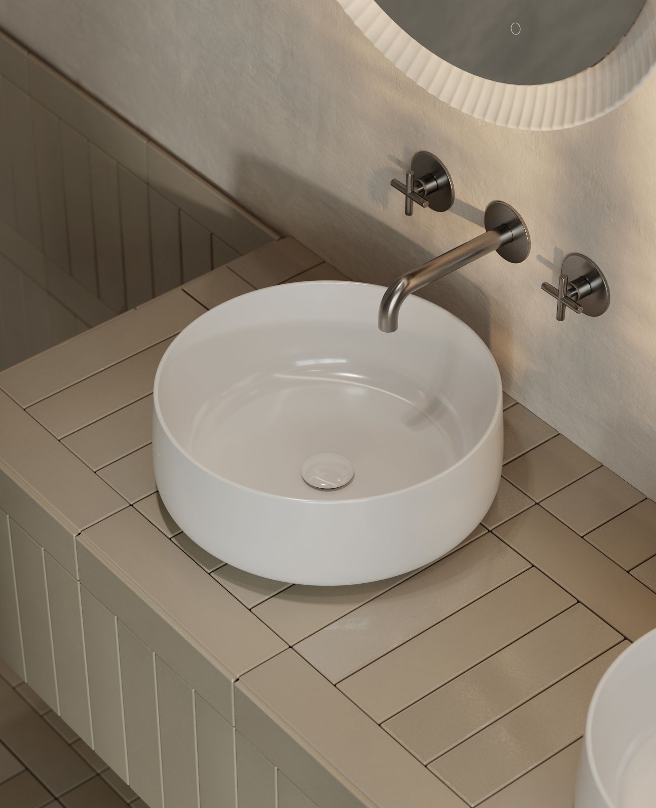 Prende ispirazione dalla forma avvolgente dei bicchieri da cognac il lavabo da appoggio COL001 Cognac di TheArtceram. Realizzato in ceramica Saniglaze, ha un bordo sottile di soli 5 mm. La collezione è disponibile in cinque diverse misure. Misura ∅ 42 x H 16 cm. Prezzo della versione bianca lucida, Iva esclusa, 305 euro. www.artceram.it